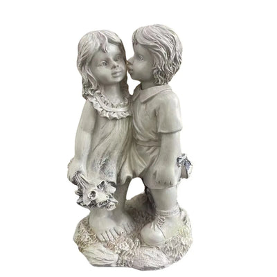 Garden Decor Endearing Sculpture Kids Sharing A Kiss | SAMAG