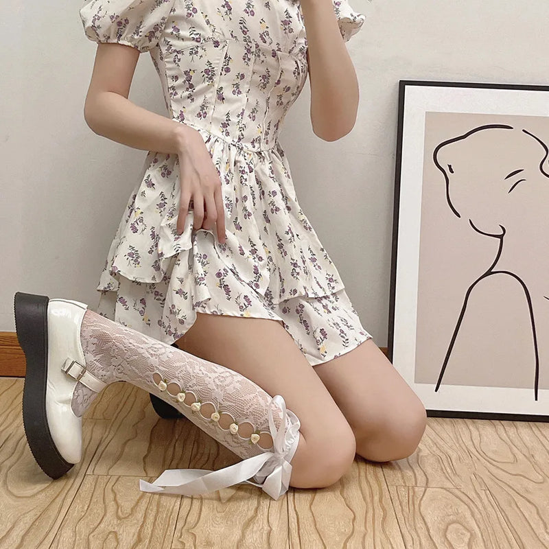Girls Sweet Stockings Sexy Lace Mesh Fishnet Stockings Knee High Socks Flower Hollow Out Bandage Bow JK Lolita Kawaii Stockings