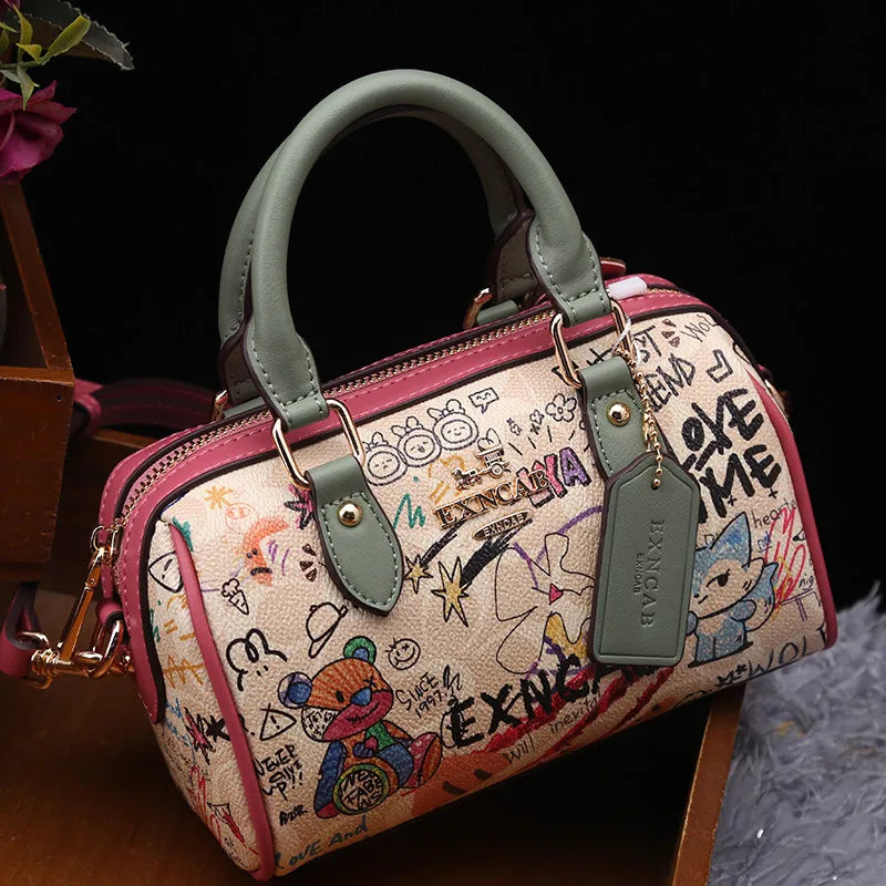 Luxury and Vintage Handheld Boston Bag with Fashion Cartoon Graffiti and premium Leather 2026 Women's Newly Trendy Crossbody Bag