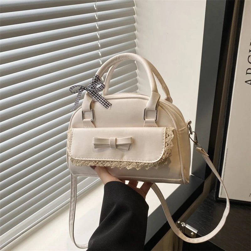 A Versatile Bow-tie Hand-held Boston Bag for Women in 2025 Korean Version, A Fashionable, Sweet and Casual Crossbody Bag