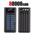 Portable Solar Charger Power Bank High Capacity External Rechargeable Solar Battery With 4 Cables For iPhone Samsung 2026