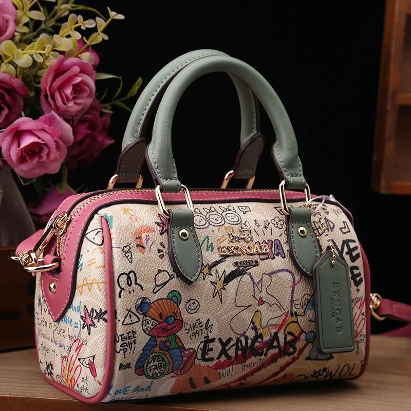 Luxury and Vintage Handheld Boston Bag with Fashion Cartoon Graffiti and premium Leather 2026 Women's Newly Trendy Crossbody Bag
