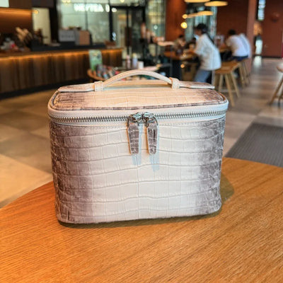 Crocodile patterned top layer cowhide makeup bag | SAMAG