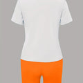 Peach Letter Print Short-Sleeved Shorts Set in a Loose White T-Shirt and an Orange Tight Short Pants Casual Outfit