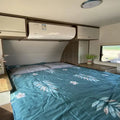 Customized Made in China Towing Caravan Luxury Electric RV Camper Equipped With Induction Cooker and Microwave Oven for Cooking