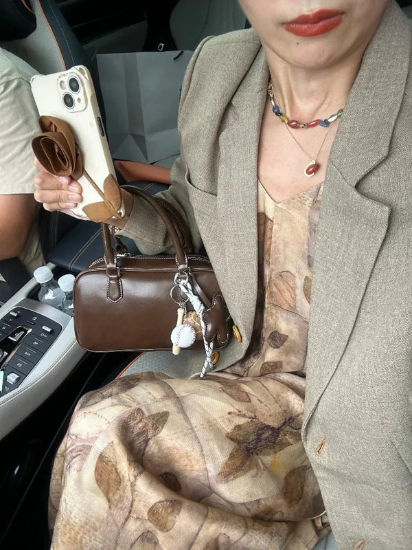 HISUELY 2026 New Commuter Small Women Handbag Boston Large Capacity Pillow Bag Soft Tanned Leather Fashion oulder Crossbody Bag