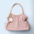 BadBlue, a Korean brand known for its niche, forest-inspired leopard print dot pattern, business-ready bag with a trendy, sweet-
