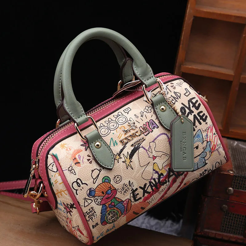 Luxury and Vintage Handheld Boston Bag with Fashion Cartoon Graffiti and premium Leather 2026 Women's Newly Trendy Crossbody Bag