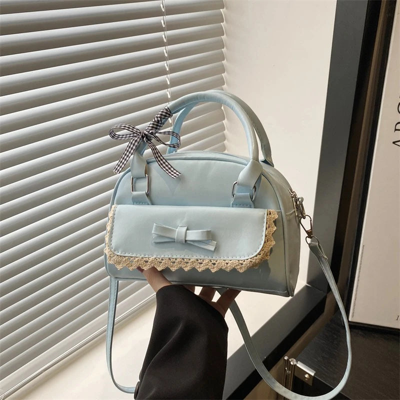 A Versatile Bow-tie Hand-held Boston Bag for Women in 2025 Korean Version, A Fashionable, Sweet and Casual Crossbody Bag