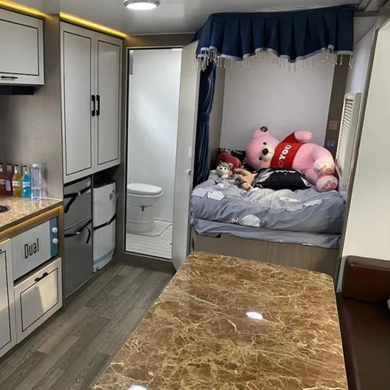 Customized Made in China Towing Caravan Luxury Electric RV Camper Equipped With Induction Cooker and Microwave Oven for Cooking