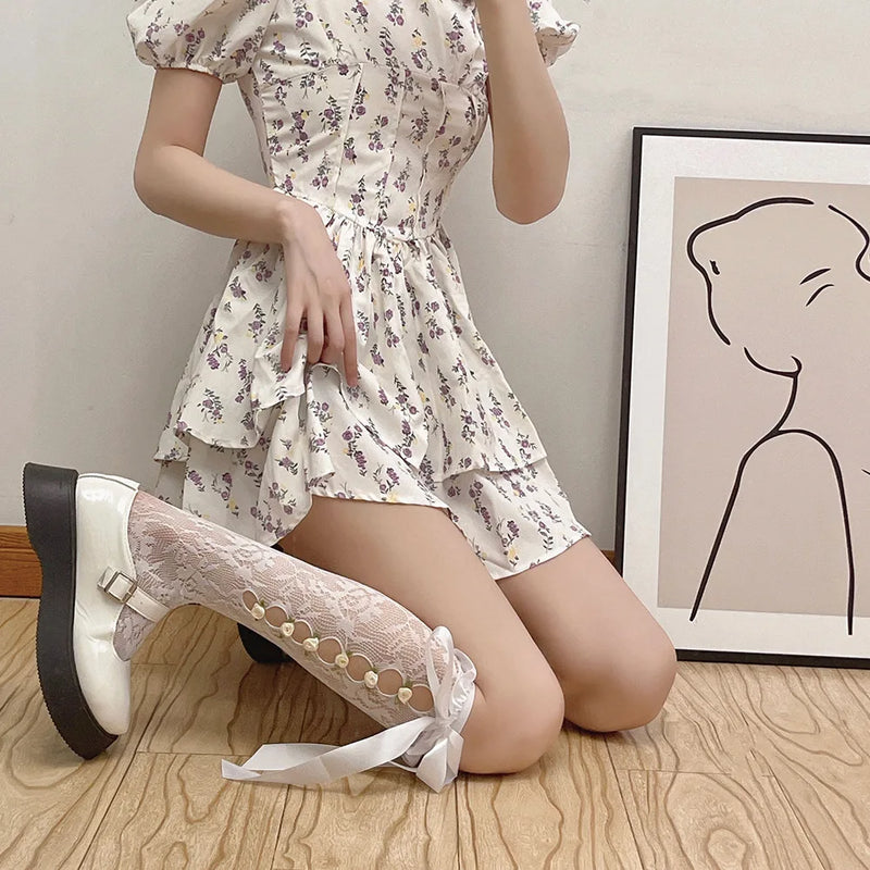 Girls Sweet Stockings Sexy Lace Mesh Fishnet Stockings Knee High Socks Flower Hollow Out Bandage Bow JK Lolita Kawaii Stockings