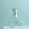 Pink eyebrow trimming scissors with built-in comb - stainless steel, precise grooming tool, creating perfect eyebrows