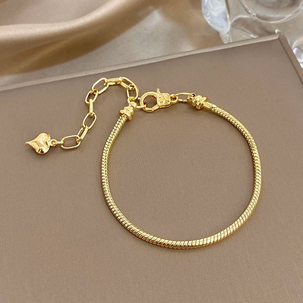 Freetry Trendy Snake Bone Chain Stainless Steel Bracelets for Women Vintage Gold Color Heart Pendant Bracelet Waterproof Jewelry