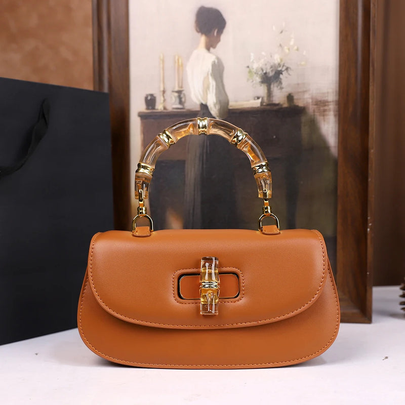 The 2025 new bamboo joint hand-held saddle bag is a versatile and high-end small single-shoulder crossbody bag for women