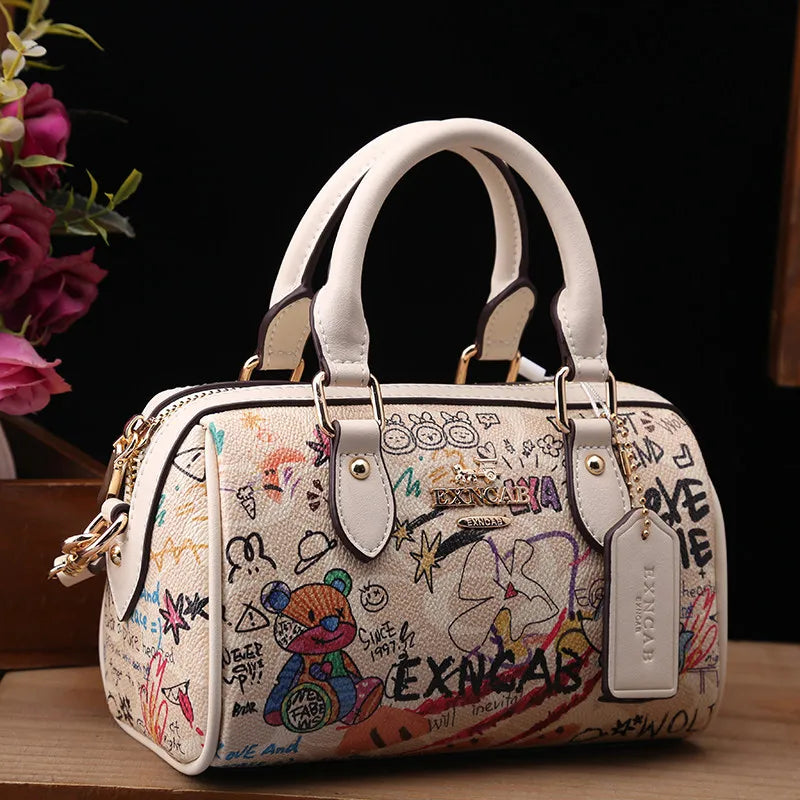 Luxury and Vintage Handheld Boston Bag with Fashion Cartoon Graffiti and premium Leather 2026 Women's Newly Trendy Crossbody Bag