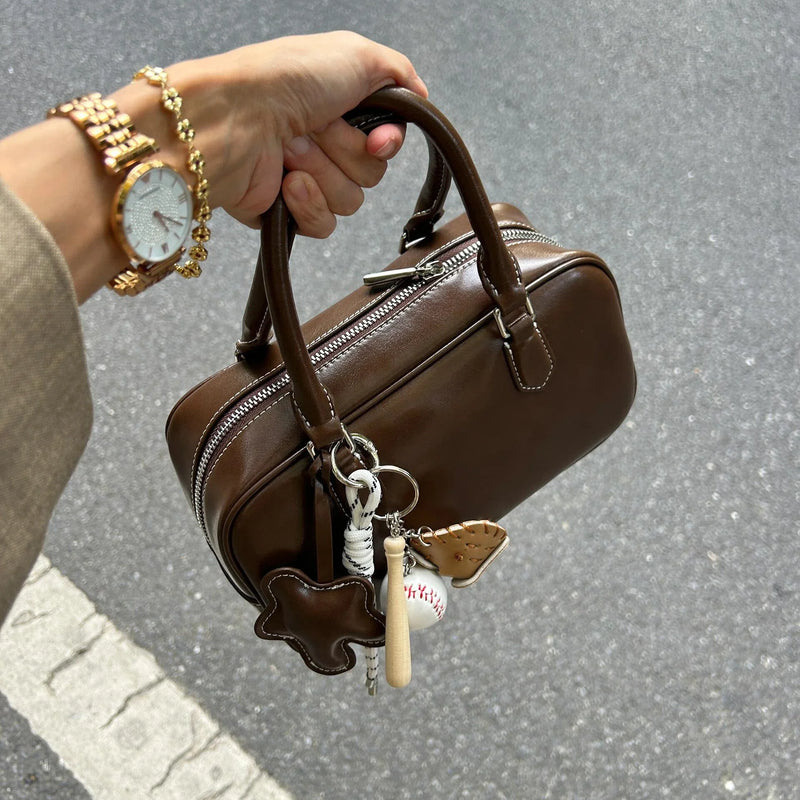 HISUELY 2026 New Commuter Small Women Handbag Boston Large Capacity Pillow Bag Soft Tanned Leather Fashion oulder Crossbody Bag